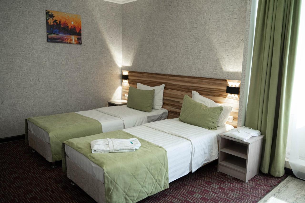 Uyutnyy Dom Hotel Taraz Buitenkant foto